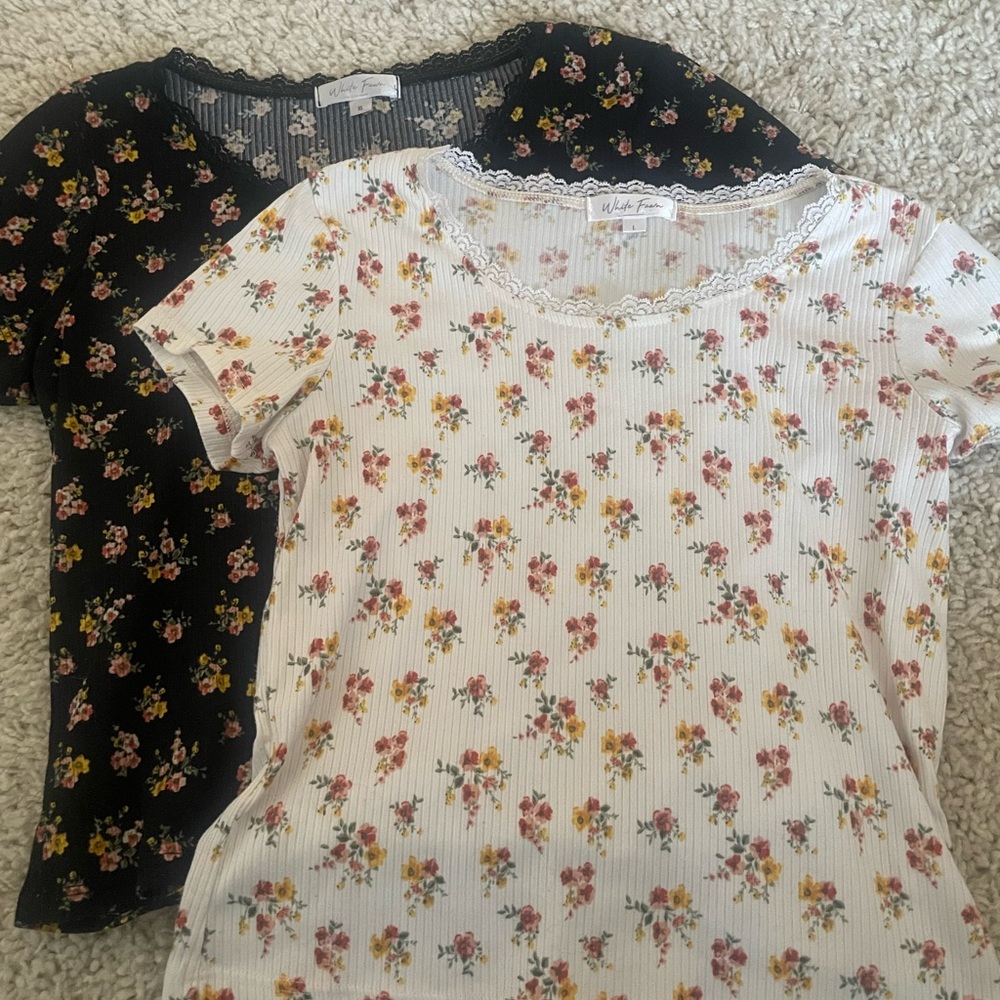set of two shirts with flowers on them